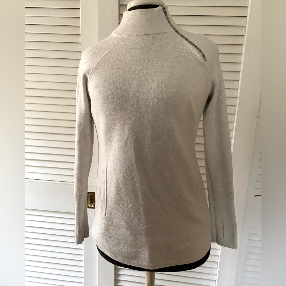 Sweater with pockets and thumb holes